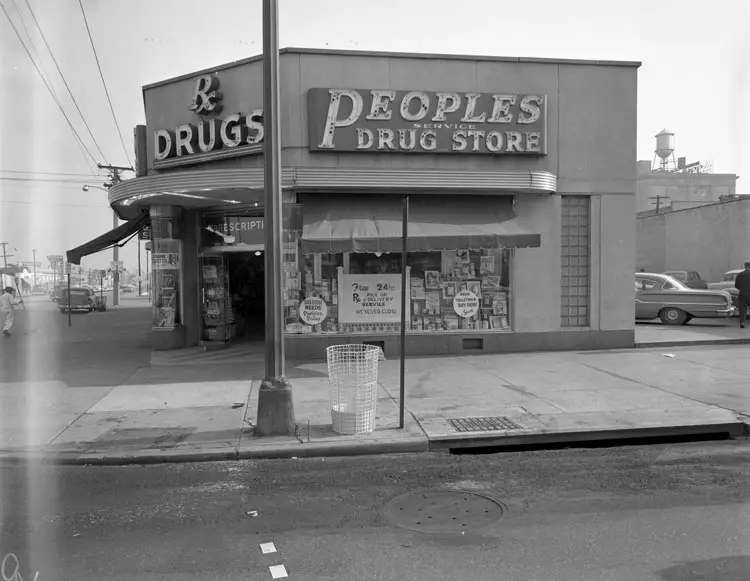 Black-and-white photograph taken by the Adolph B. Rice Studio depicting the exterior or interior (depending on the image content) of Peoples Drug Store. The image is dated September 27, 1960, and is a 4 x 5-inch safety film negative.