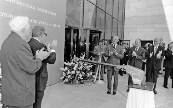 Historical moment at the National Air and Space Museum's building opening on the National Mall on July 1, 1976, with President Gerald Ford, Chief Justice Warren Burger, and Vice President Nelson Rockefeller.