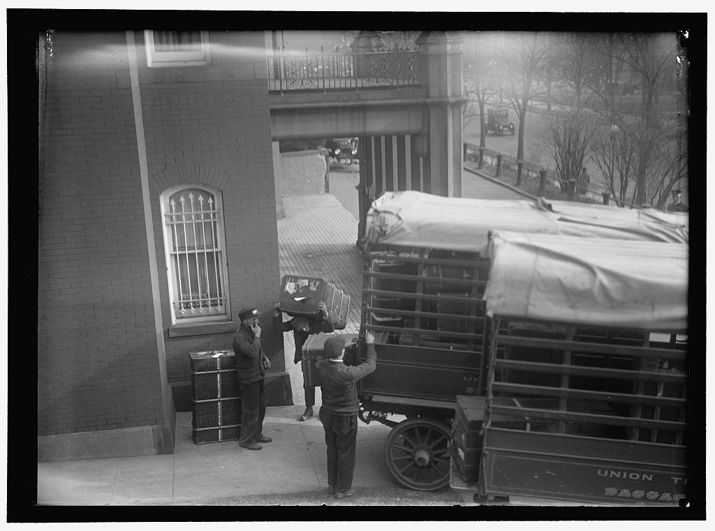 Workers loading trunks and baggage onto a Union Transfer Baggage Company truck outside the German Embassy, February 1917.