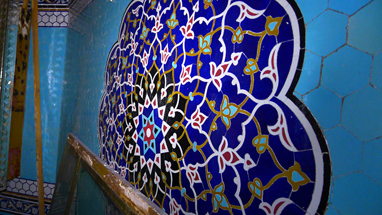 Crumbling Persian blue tiles inside the abandoned Iranian Embassy, 2013