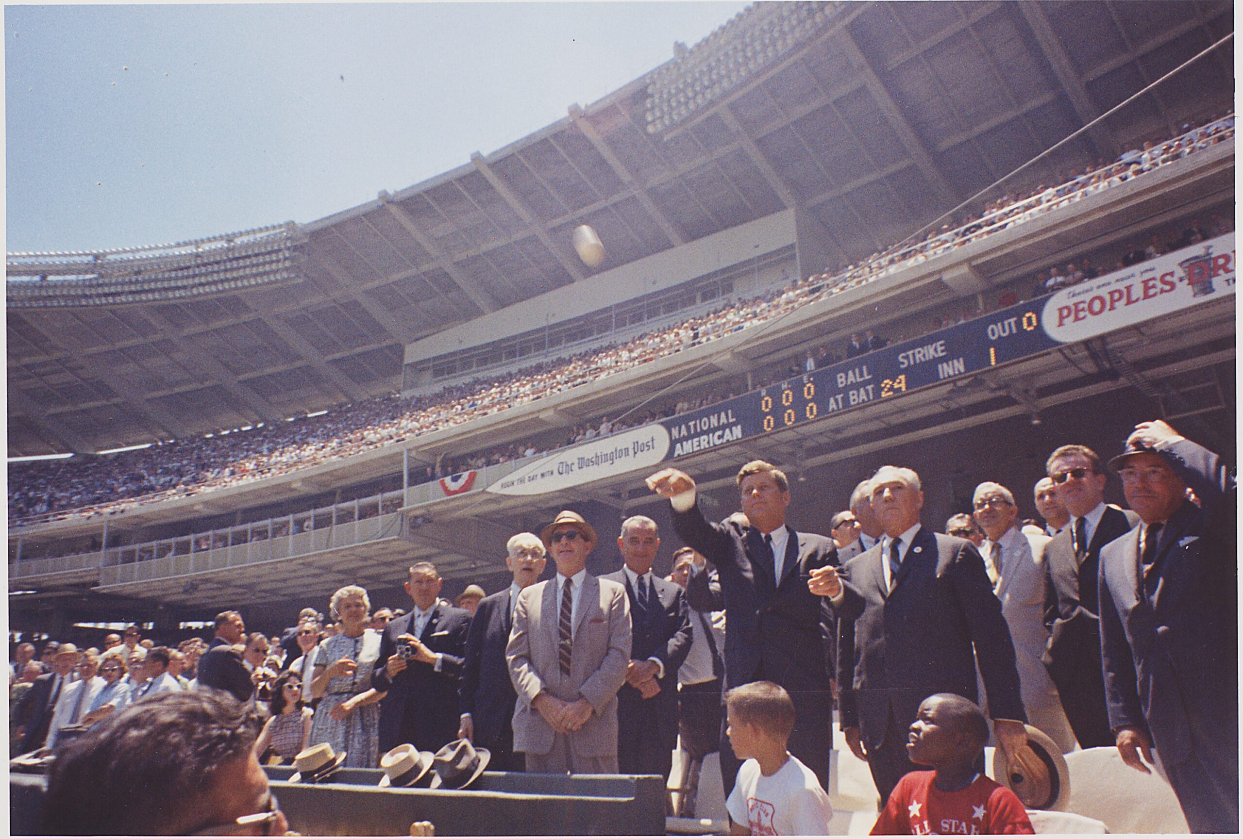 President Kennedy in mid-throw, first pitch of the 1962 All-Star Game at D.C. Stadium.