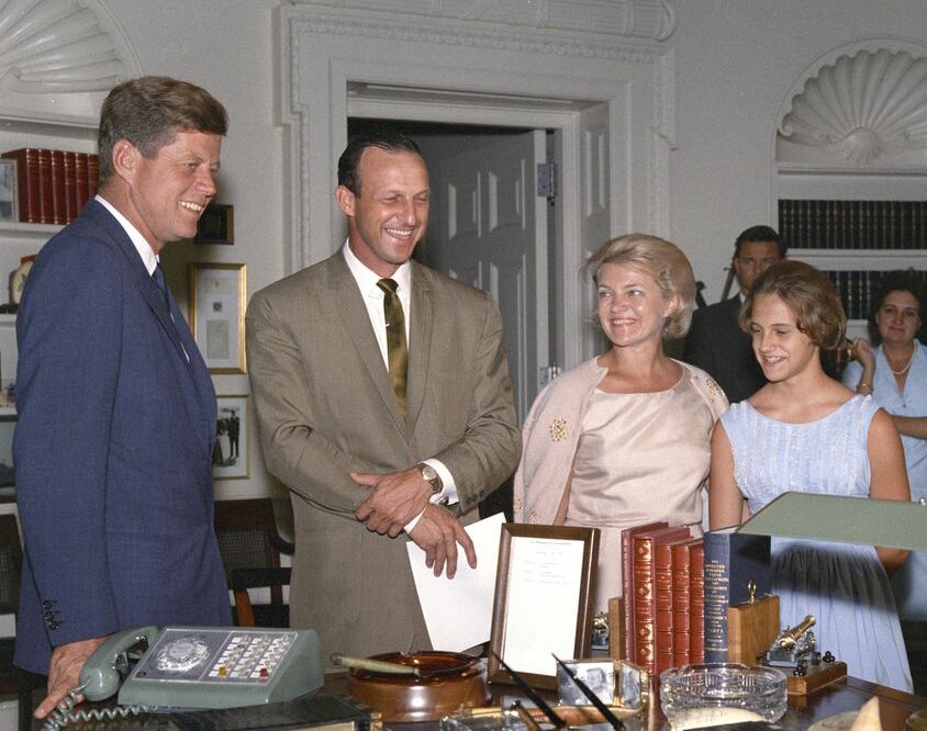 President Kennedy meets with Stan Musial and his family in the Oval Office.