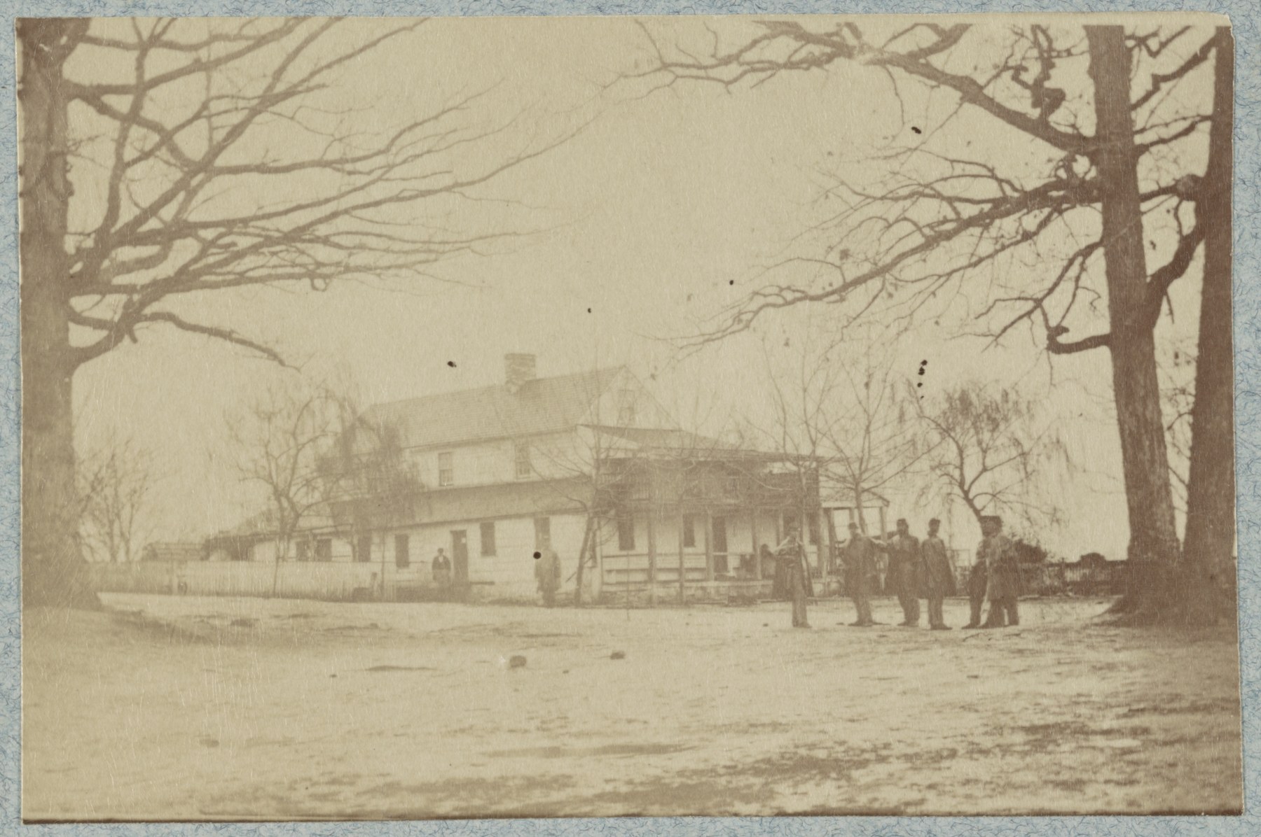 Group of soldiers standing outside Taylor's Tavern near Falls Church, Virginia, circa 1861-1865
