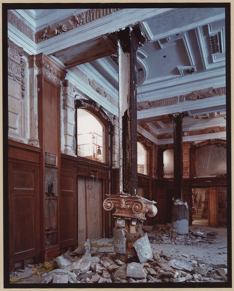 Fallen column capital amid demolition debris in the Willard Hotel Willard Room, 1984
