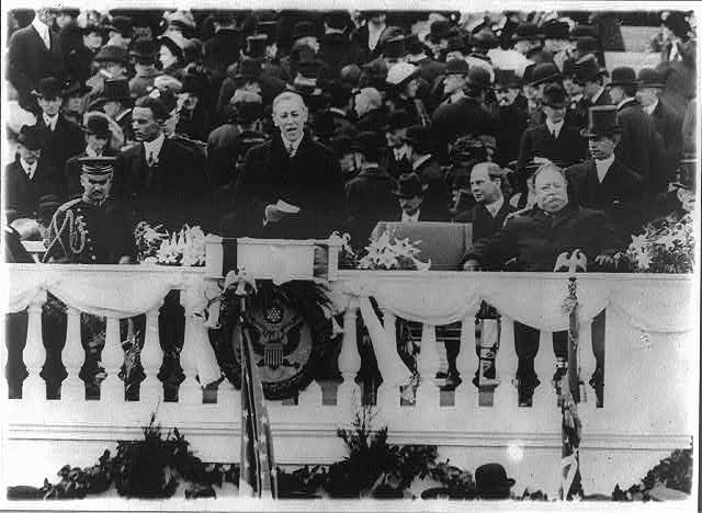 President Woodrow Wilson delivers his inaugural address on the east portico of the U.S. Capitol, March 4, 1913.