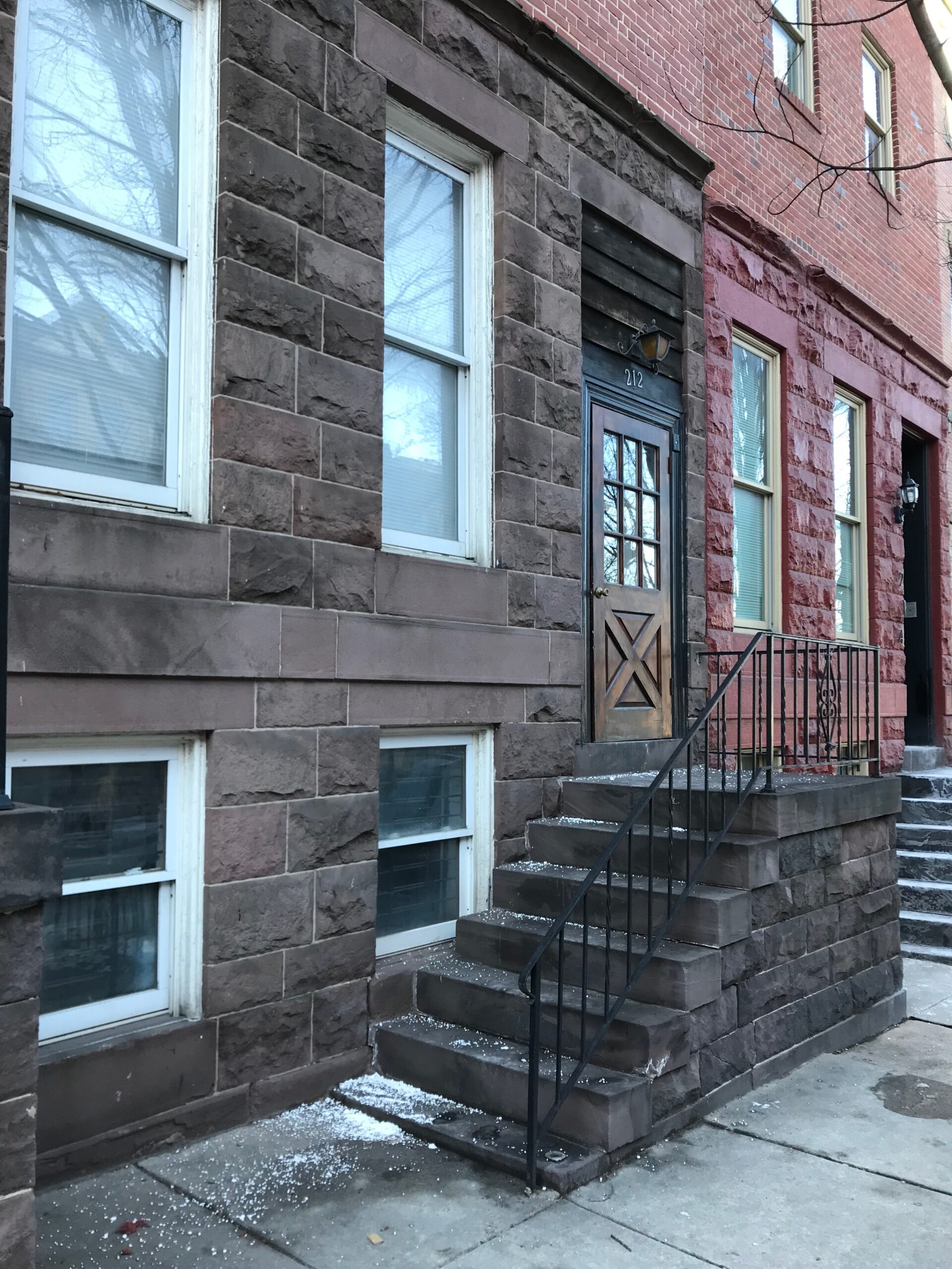 Rowhouse exterior at 212 East Biddle Street, Baltimore
