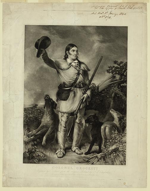 Mezzotint of Davy Crockett standing with a raccoon-skin hat in one hand and a rifle in the other, three hunting dogs at his feet, in a wilderness pose. Engraved by C. Stuart from a John Gadsby Chapman portrait, 1839.