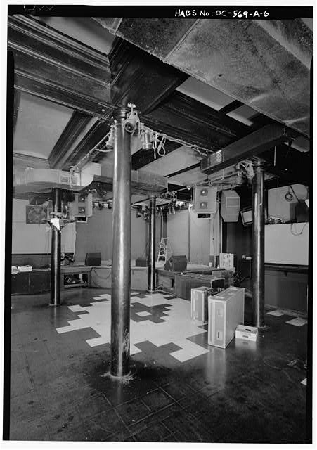 Black and white photograph of cast-iron columns inside the first floor rear room of the Atlantic Building at 930 F Street NW, the room that became the original 9:30 Club