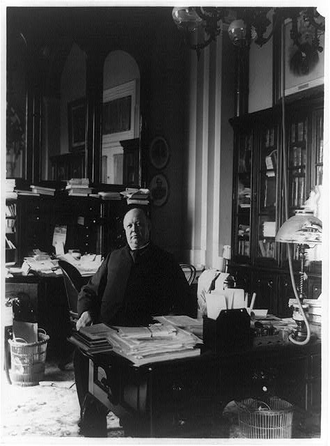 Speaker Thomas B. Reed of Maine seated at his desk in 1890, full length portrait by Frances Benjamin Johnston, the year he became Speaker of the House.