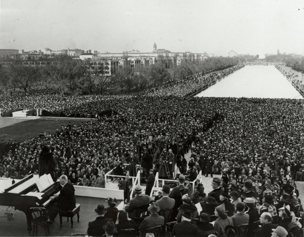 Marian Anderson sings on the steps of the Lincoln Memorial on Easter Sunday, April 9th, 1939, with the Reflecting Pool stretching east toward the Washington Monument
