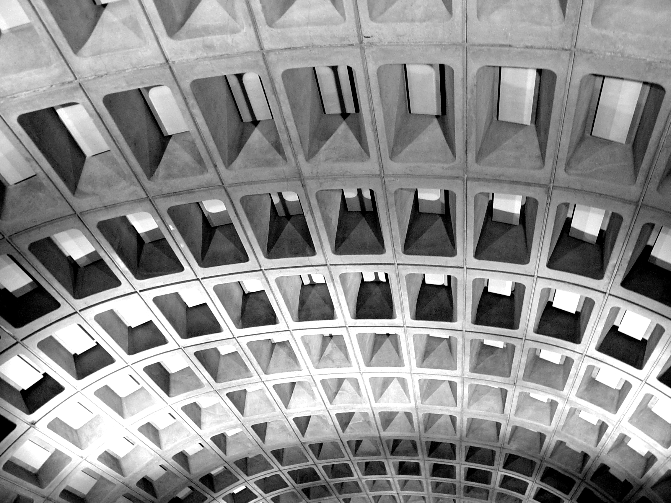 A close view of the coffered concrete arch ceiling at Metro Center station, the signature Harry Weese vault that defines the look of the Washington Metro.