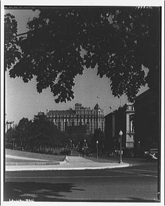 Distant view of the Raleigh Hotel from Pennsylvania Avenue, photographed by Theodor Horydczak between 1920 and 1950
