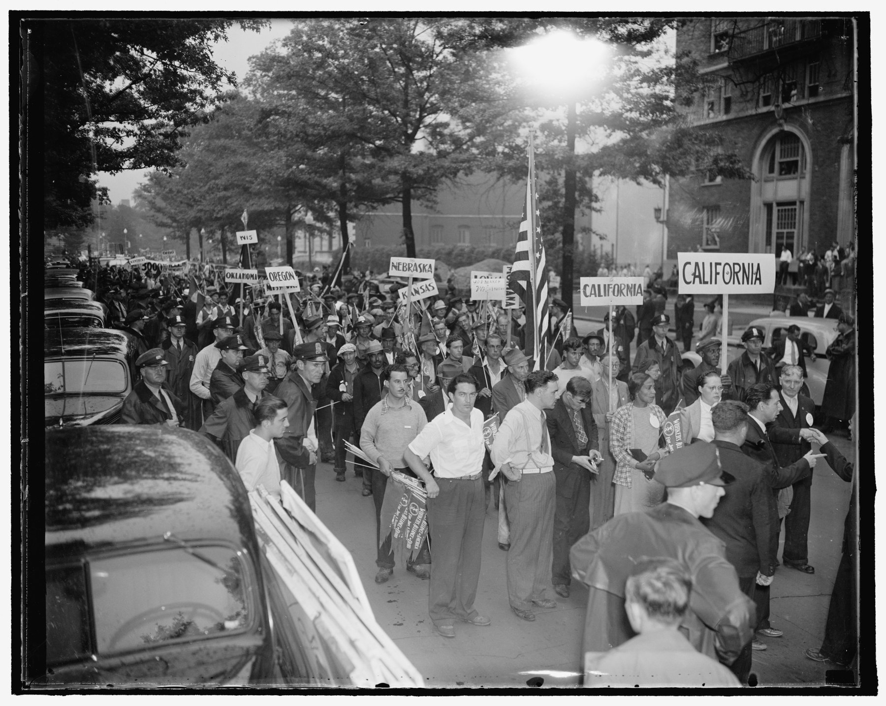 Washington DC police line up in August 1937 during a WPA workers march