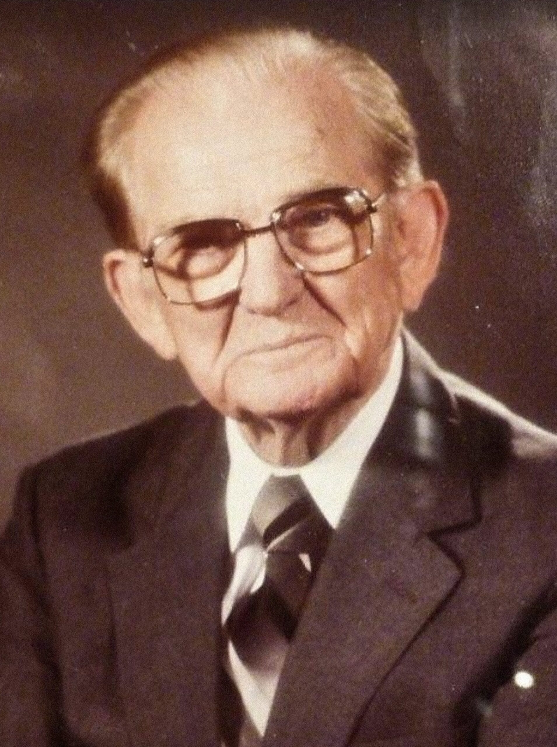 Color official portrait of Senator John C. Stennis signed in late 1984