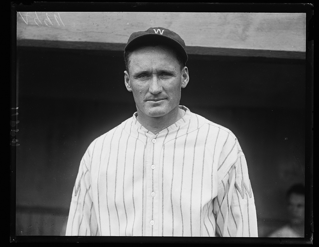 Walter Johnson in 1925, full-length portrait by Harris and Ewing