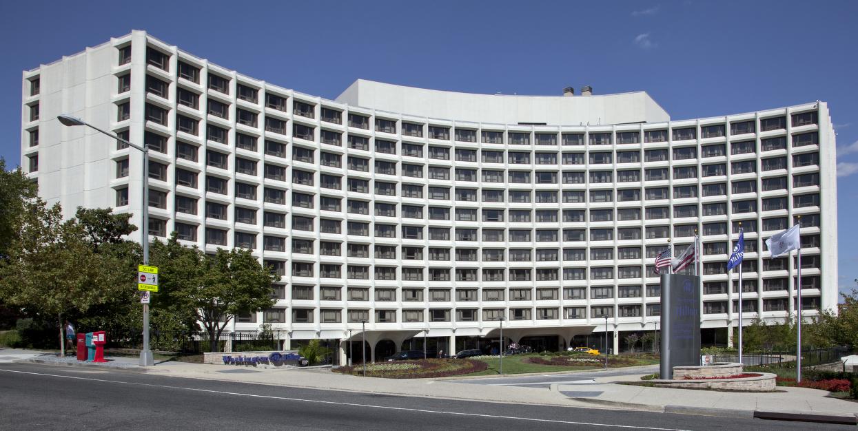 The Washington Hilton hotel today, a curved concrete building on Connecticut Avenue NW