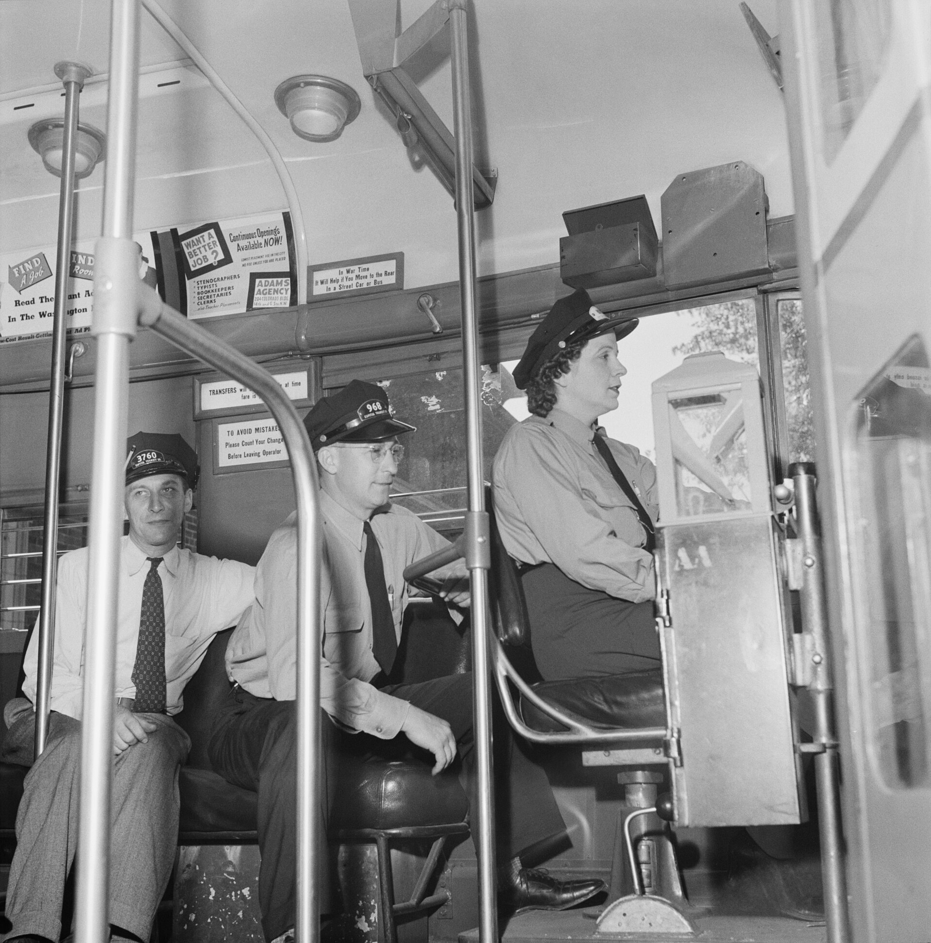 A 1943 Esther Bubley photograph aboard a Washington streetcar showing an instructor teaching a woman to operate a one-man car during World War II