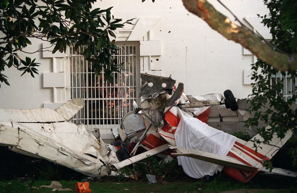 Wreckage of Frank Corder's stolen Cessna 150L against the south wall of the White House, September 12, 1994