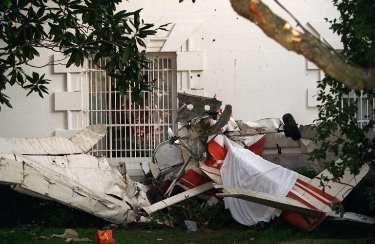 Wreckage of Frank Corder's stolen Cessna 150L against the south wall of the White House, September 12, 1994