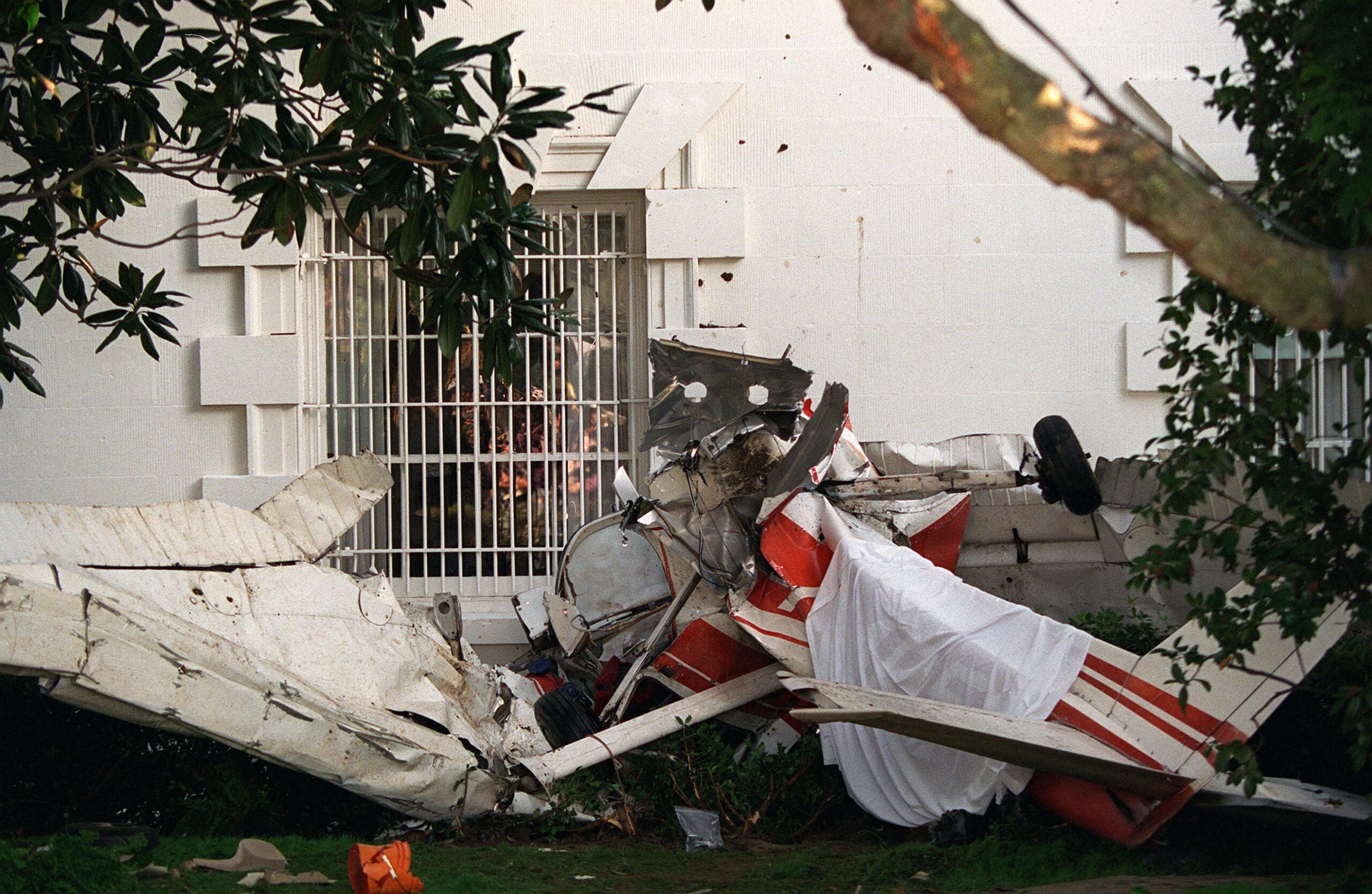 Wreckage of Frank Corder's stolen Cessna 150L against the south wall of the White House, September 12, 1994