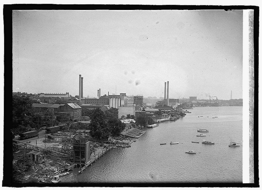 Georgetown waterfront in 1923 showing industrial buildings along the Potomac before the Whitehurst Freeway