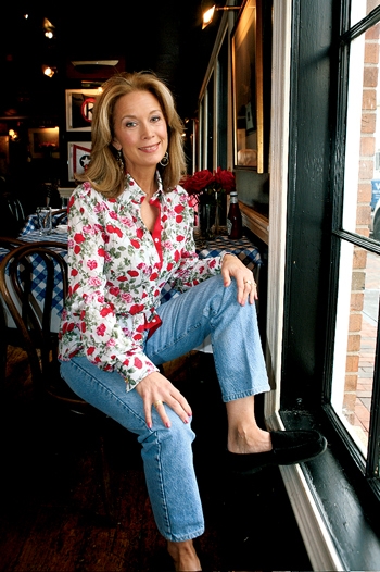 Carol Ross Joynt seated inside Nathans Restaurant in Georgetown, photographed by David Hume Kennerly