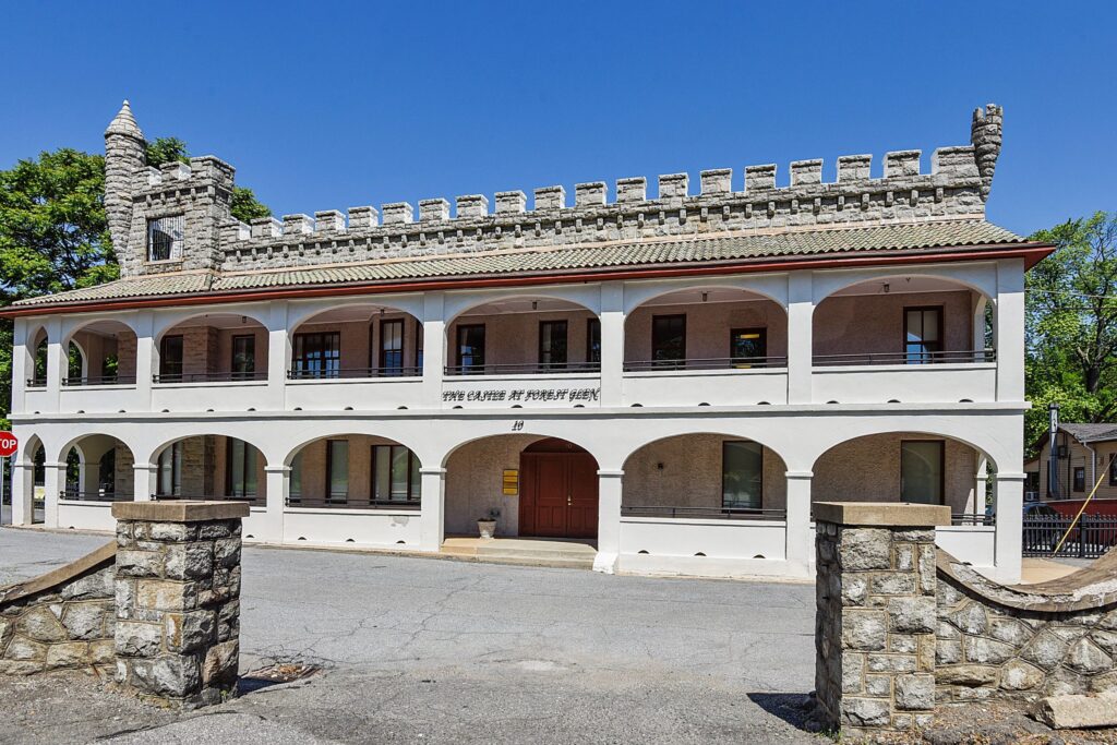 The Castle at Forest Glen at 10 Post Office Road Silver Spring Maryland modern exterior with granite battlements turrets and arcade
