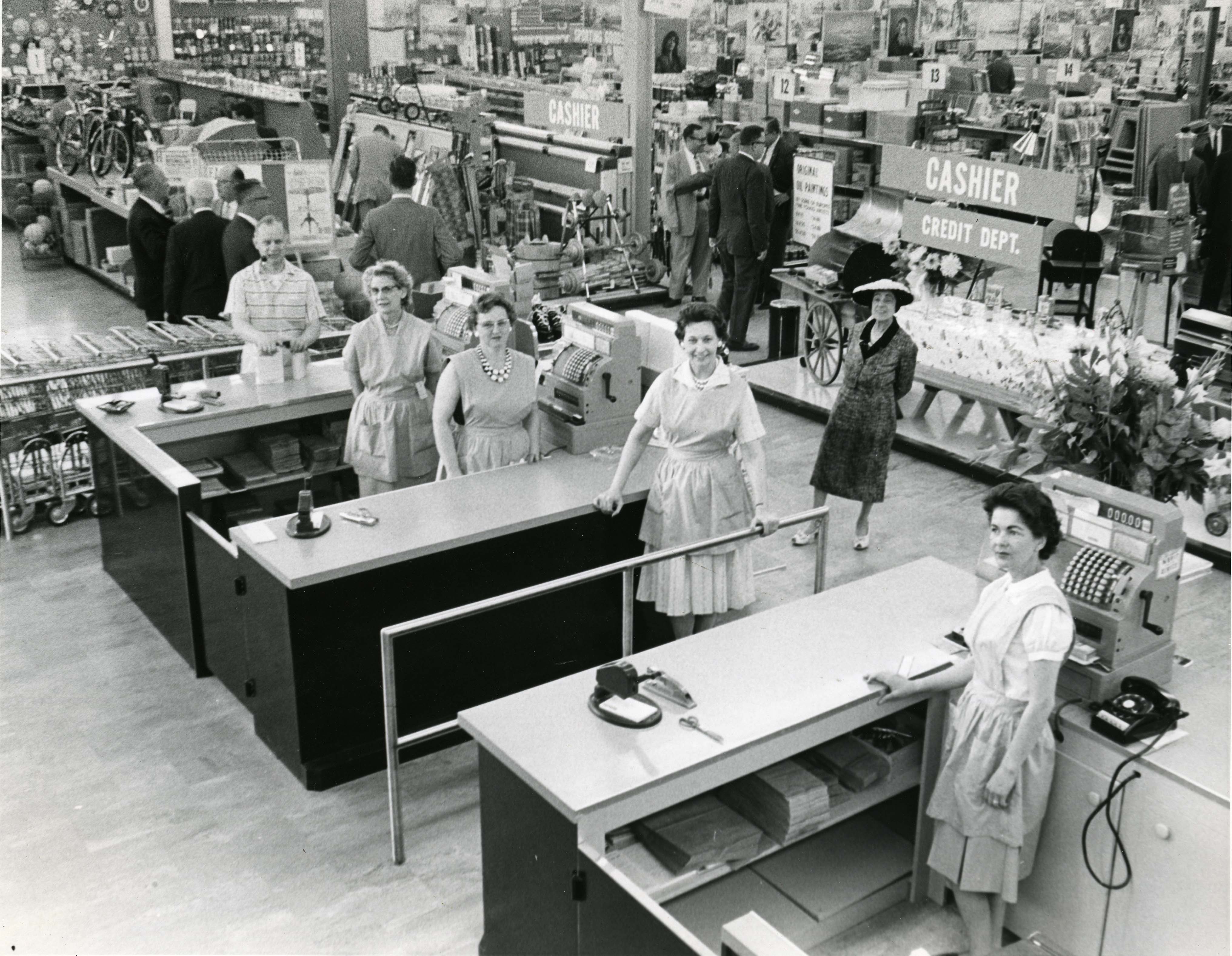 Checkout counters at the Hechinger Alexandria store in 1961, with customers in line at supermarket-style registers, courtesy DC History Center