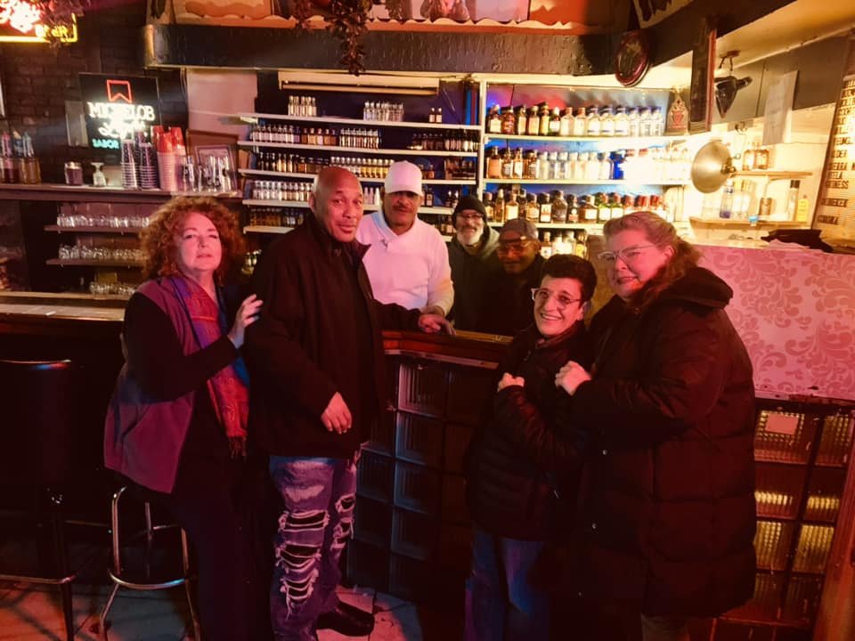 Clinnie Dickie Dickens with longtime regulars at Dans Cafe in the 1990s