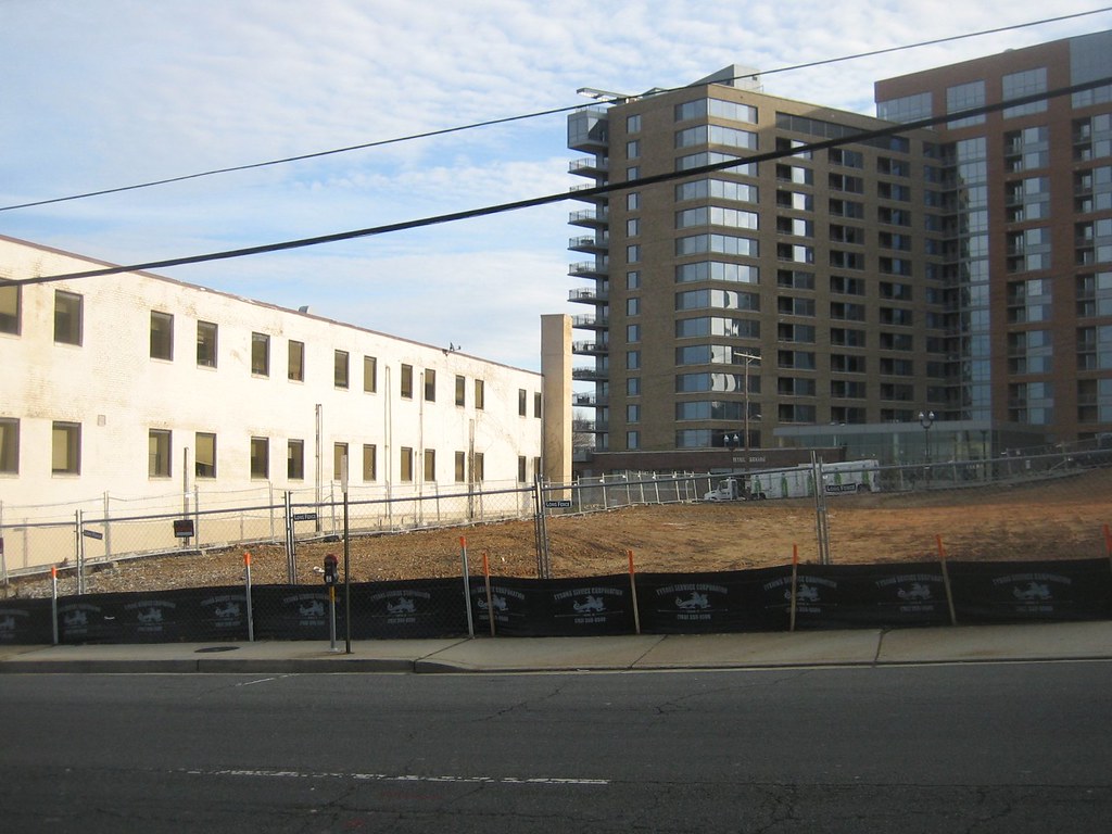Empty fenced lot at the former Dr. Dremo's parcel, Arlington, December 2008
