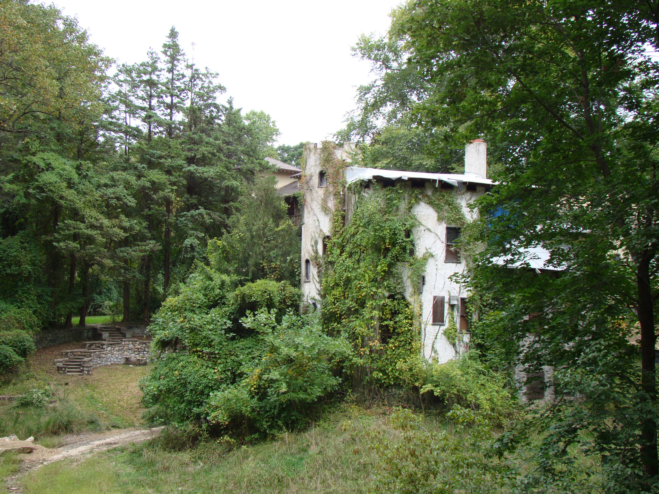 The English Castle, a small round stuccoed sorority clubhouse built in 1904 at the National Park Seminary in Forest Glen, Maryland. This is NOT the Castle at 10 Post Office Road.