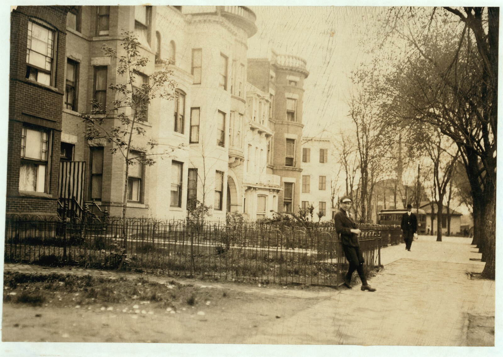 Wooden tenements housing red-light resorts on Ohio Avenue near 14th Street NW, Washington DC, photographed by Lewis Hine in 1912 inside the old Murder Bay district.