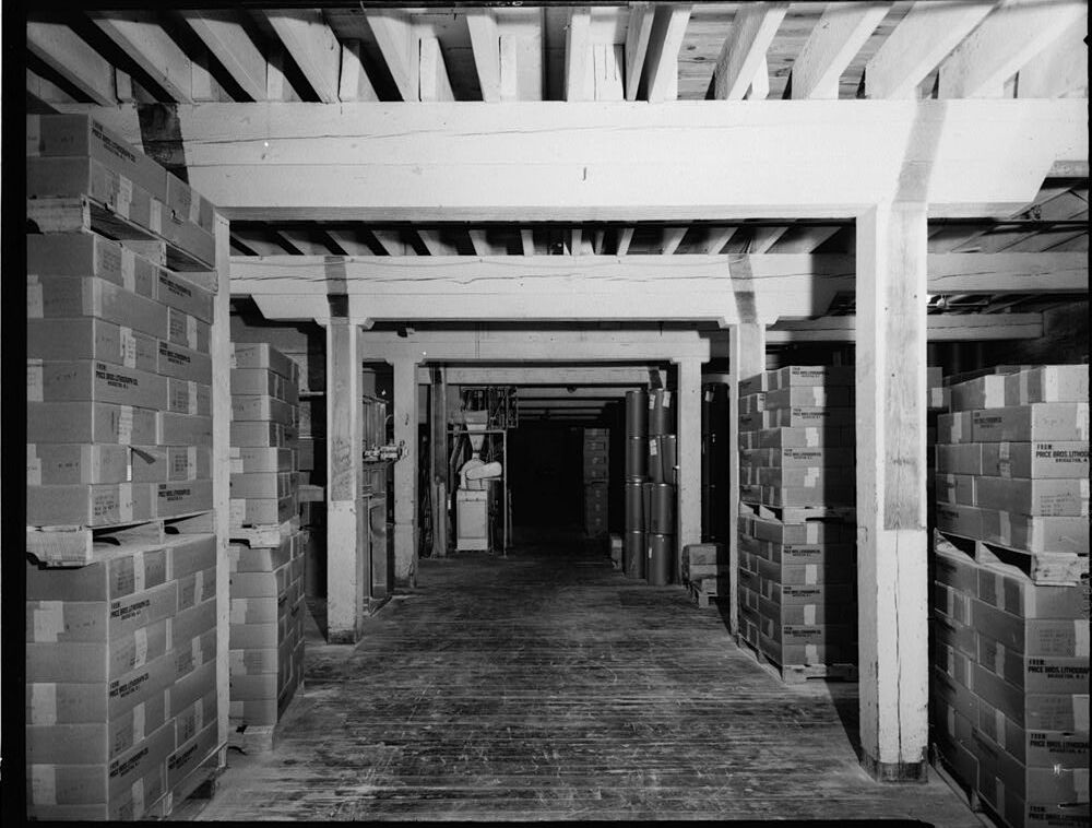 Interior of Bomford's Mill in 1967 showing heavy timber posts and beams