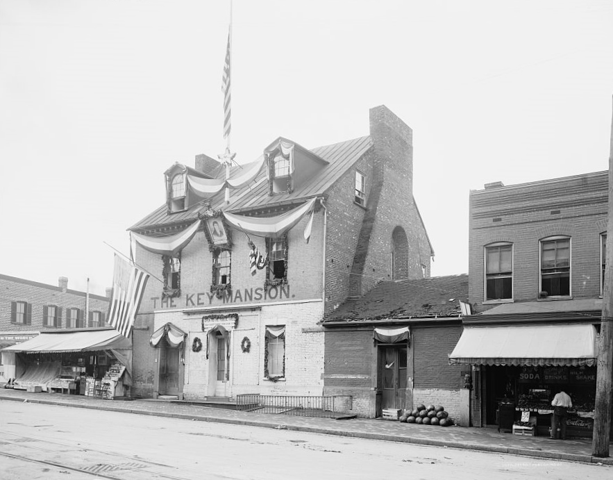 The Key Mansion draped in flags and bunting after it opened as a Francis Scott Key museum around 1908.