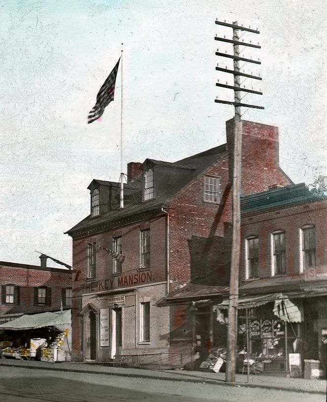 The Key Mansion in Georgetown boxed in by commercial storefronts in its later years.