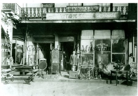 Nathan Krupsaw outside his antique store on Pennsylvania Avenue, 1910