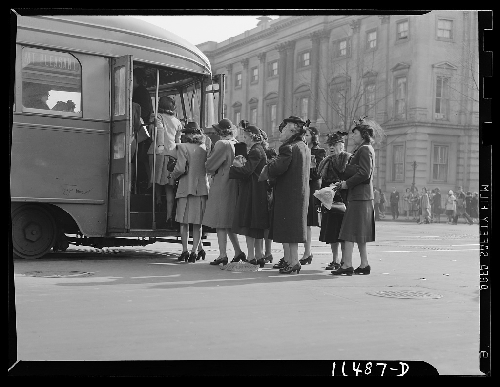 Shoppers boarding a Mount Pleasant streetcar at 7th and F Streets NW in 1942