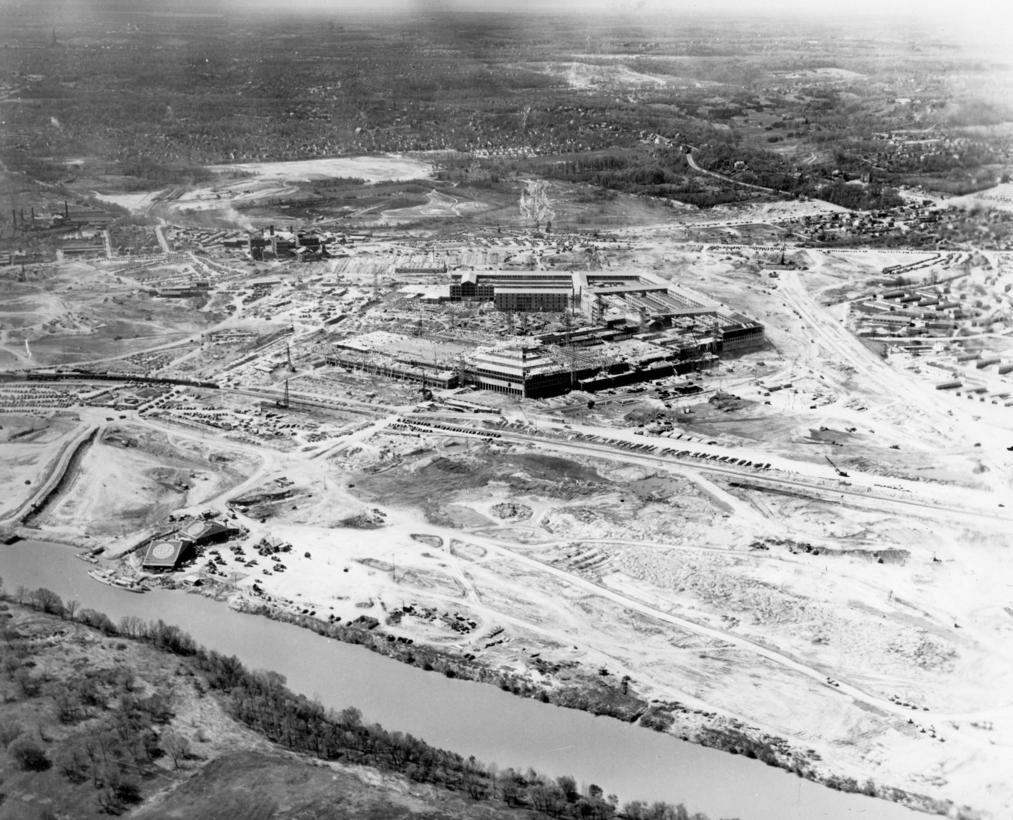 Pentagon construction, aerial view on April 18, 1942, showing four of the five sides framed up and the pentagonal shape emerging on the Arlington site