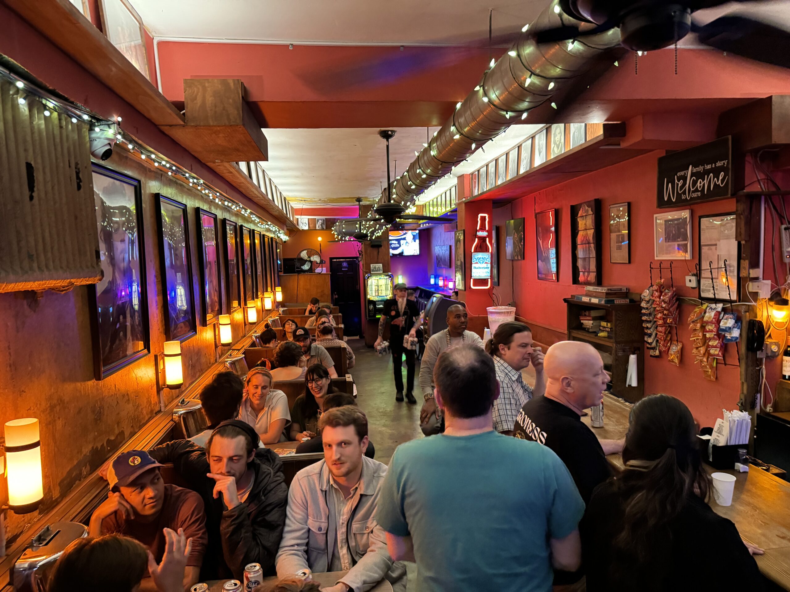 Original 1935 built-in wood booths along the wall of the Raven Grill
