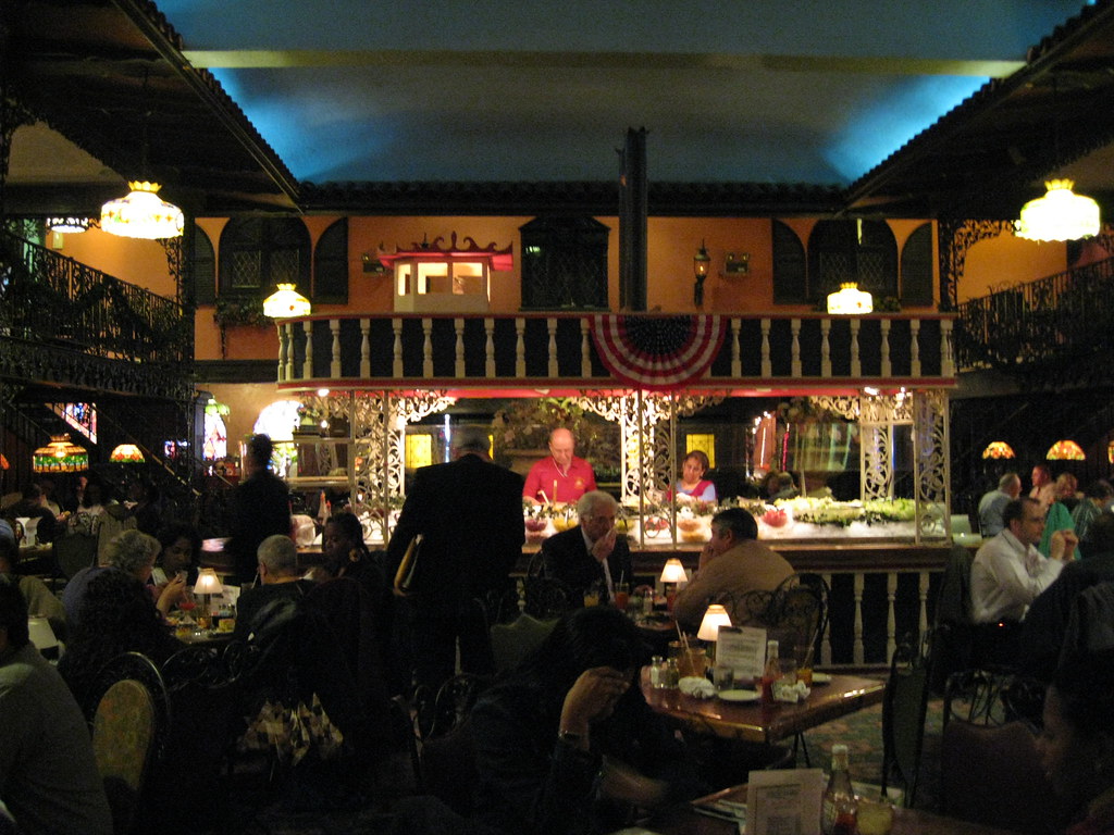 First-floor dining room with iron grillwork balcony at Tom Sarris Orleans House, January 2008