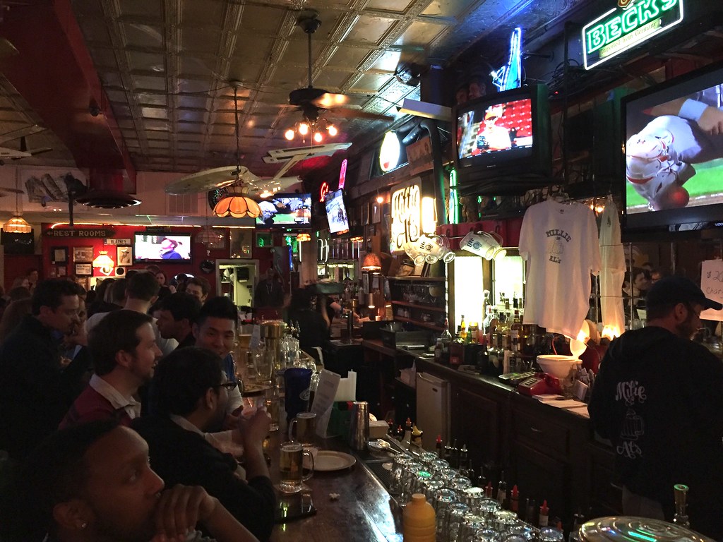 A packed bar under the pressed-tin ceiling at Millie and Al's on its final week, April 6, 2016. Photo by Joe Flood via F