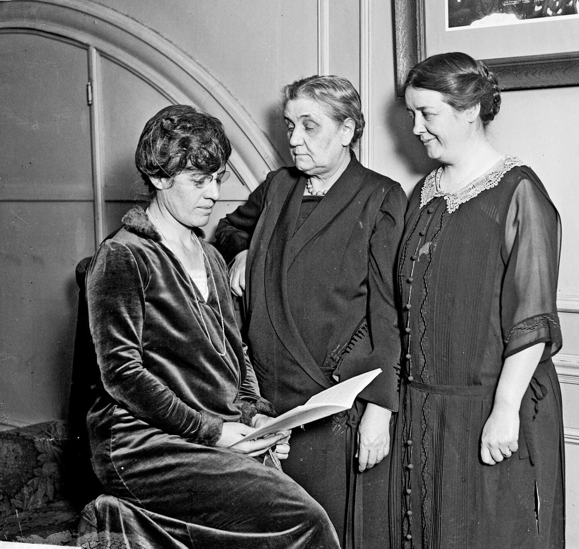 Dr. Carrie Weaver Smith standing with Jane Addams and Mrs. William Lewis, Chicago, 1925
