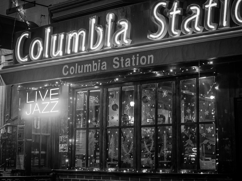 Columbia Station neon sign with Live Jazz sign in the window at 2325 18th Street NW