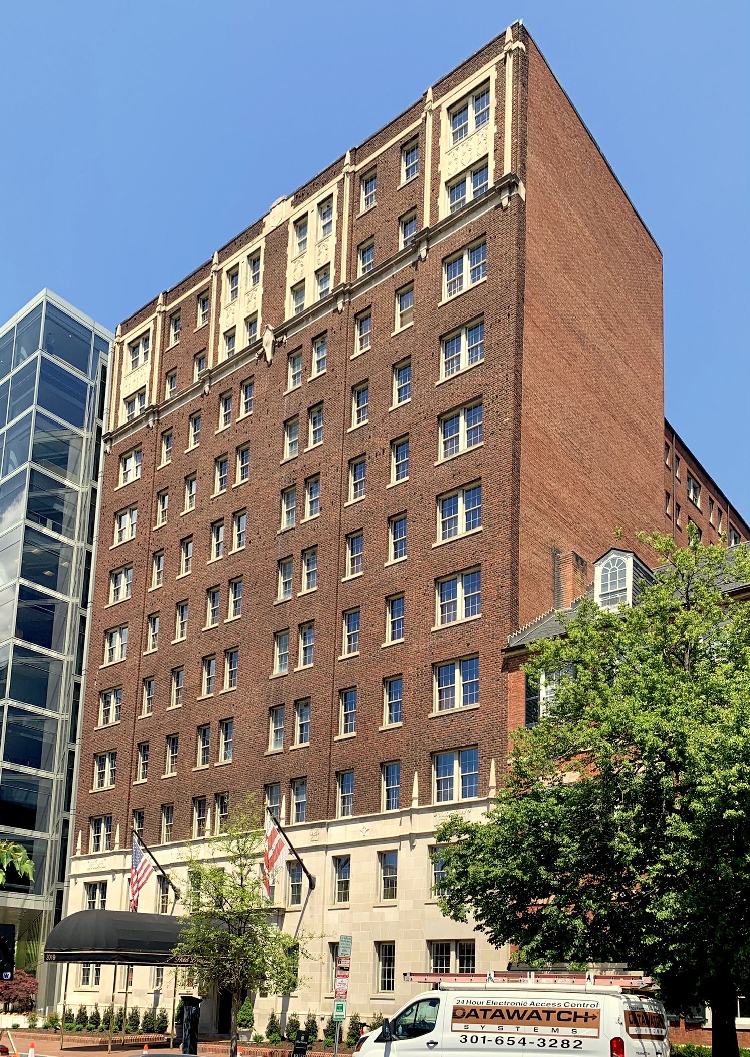 Hotel Lombardy exterior showing red brick and limestone facade at 2019 Pennsylvania Avenue NW in 2022