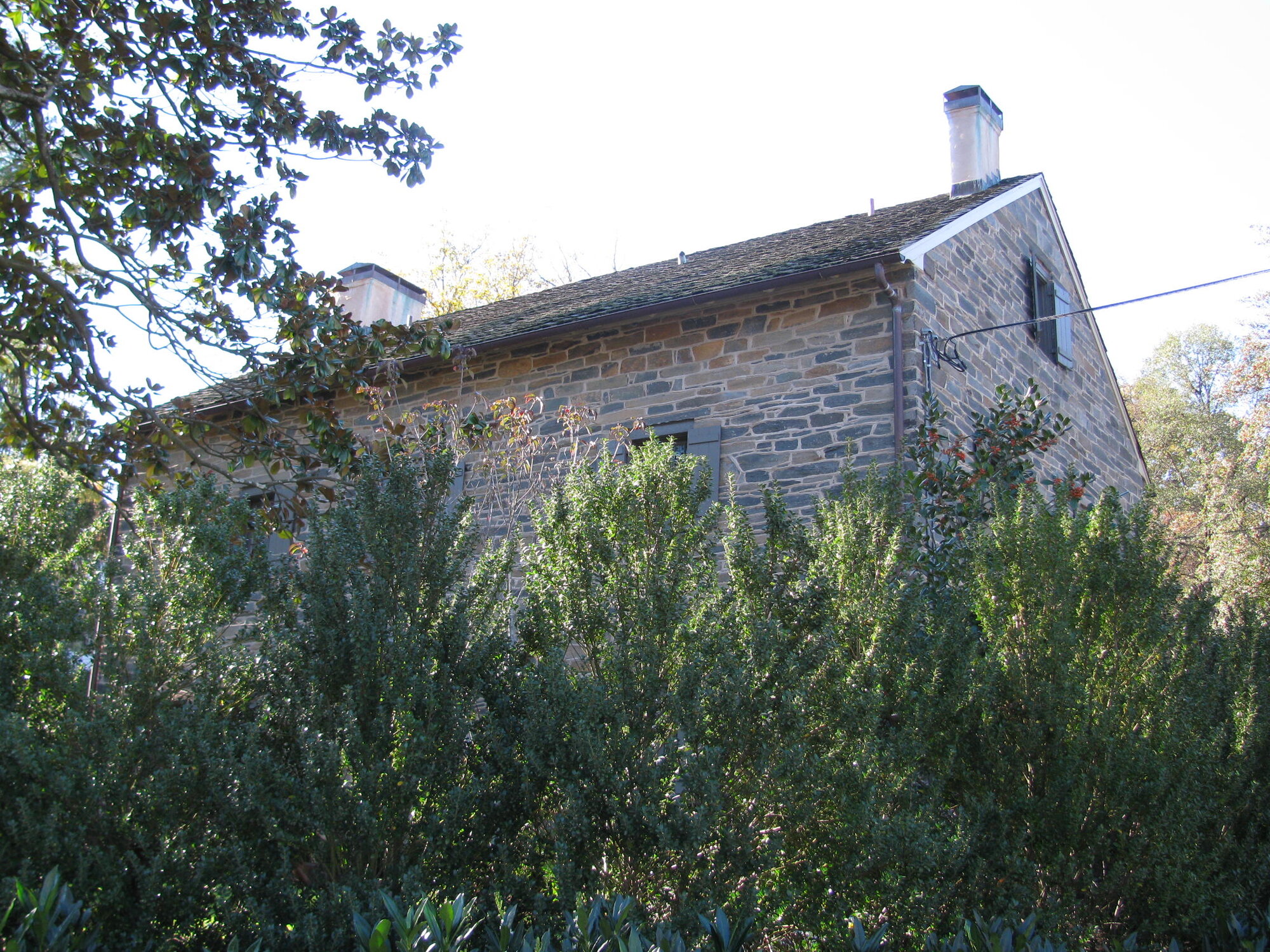Side view of the Peirce Still House at 2400 Tilden Street NW