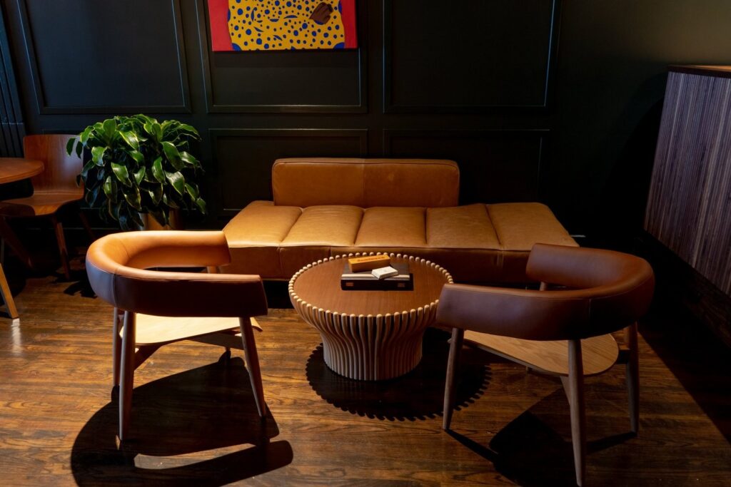 Shanklin Hall lounge at 2325 18th Street NW with leather seating and local artwork
