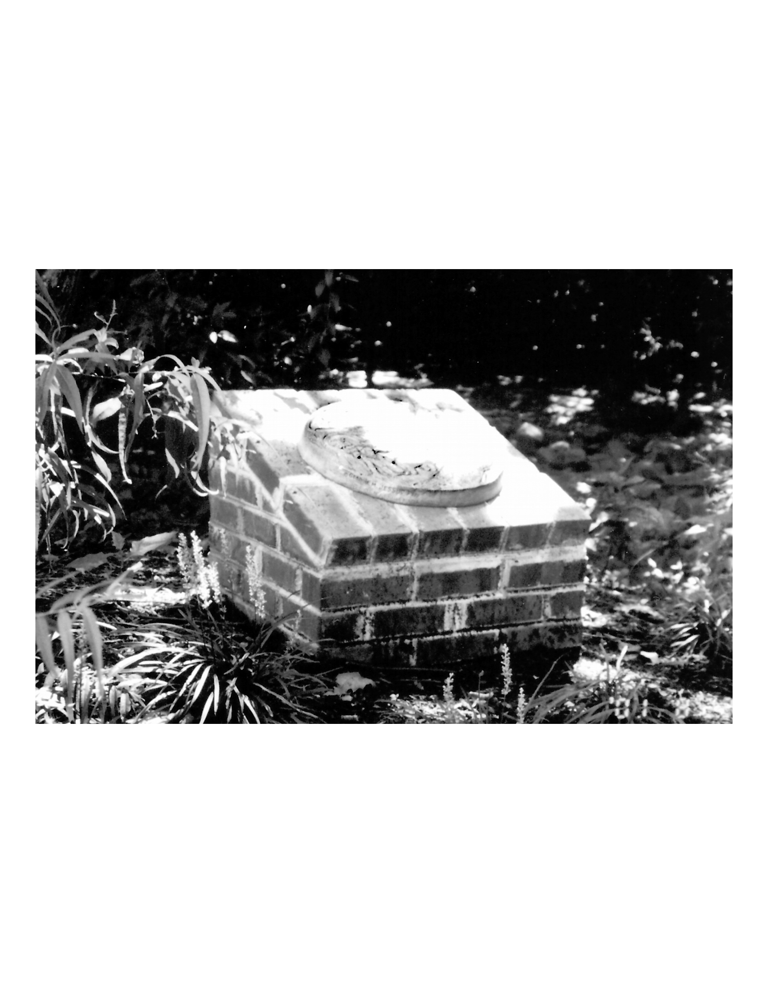 Brick memorial to Christopher Columbus Hall and Maria Hall in the ravine behind Linway Terrace Park in McLean, Virginia.