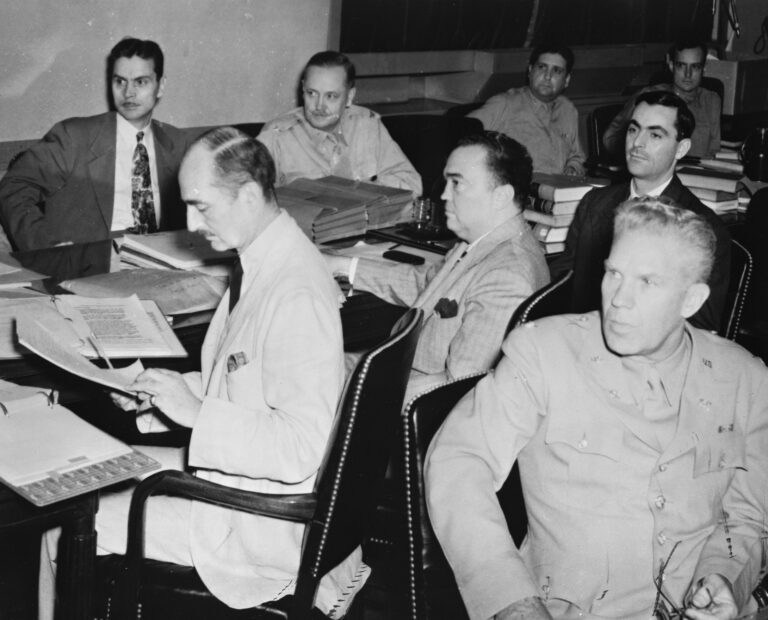 Francis Biddle and J. Edgar Hoover seated at the 1942 Nazi saboteur trial