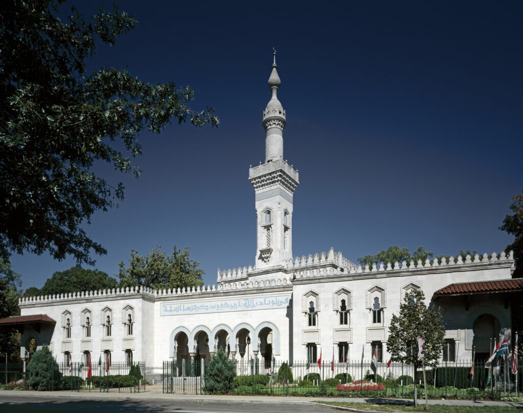 The white limestone facade and minaret of the Islamic Center of Washington on Massachusetts Avenue NW.