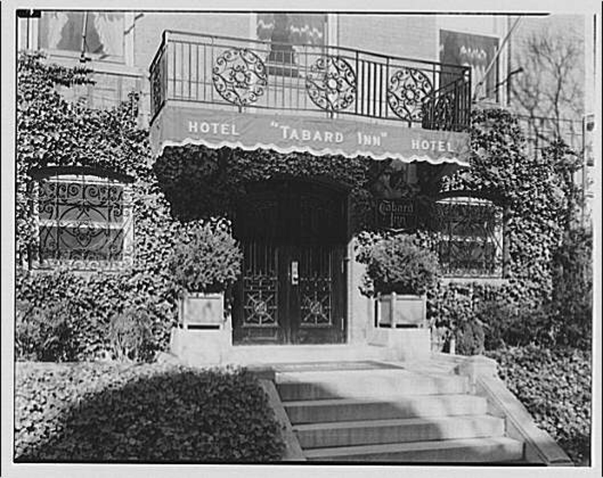 Entrance of the Tabard Inn at 1739 N Street NW under its "Hotel Tabard Inn" marquee, photographed by Theodor Horydczak